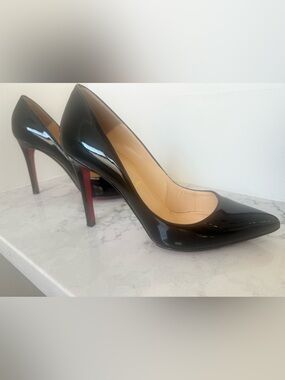 Christian Louboutin Black Patent Leather Pumps with Signature Red Sole